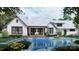 Tranquil backyard retreat with a refreshing pool, a stone-clad fire pit, and a covered outdoor living space at 6515 Rehobeth Rd # 2, Waxhaw, NC 28173