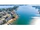 Aerial view of lakefront community with houses and docks at 130 Sandy Shore Dr, Mooresville, NC 28117