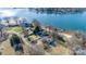 Stunning lakefront home with expansive views and sandy shoreline at 130 Sandy Shore Dr, Mooresville, NC 28117
