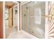 Bathroom with shower stall, tiled floor, and marble vanity at 130 Sandy Shore Dr, Mooresville, NC 28117