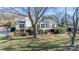 Back of house with large deck and stairs at 130 Sandy Shore Dr, Mooresville, NC 28117