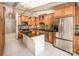Kitchen boasts granite countertops and an island at 130 Sandy Shore Dr, Mooresville, NC 28117