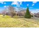 Large backyard with a brick home and expansive lawn at 144 Spring Forest Dr, Shelby, NC 28152