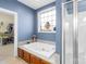 Relaxing bathroom with soaking tub, walk-in shower, and ample closet space at 144 Spring Forest Dr, Shelby, NC 28152