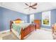 Spacious bedroom with hardwood floors, ceiling fan, and neutral walls at 144 Spring Forest Dr, Shelby, NC 28152