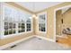 Bright breakfast nook with tile floors and views of the backyard at 144 Spring Forest Dr, Shelby, NC 28152