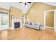 Spacious Gathering room boasts hardwood floors, fireplace, and lots of natural light at 144 Spring Forest Dr, Shelby, NC 28152