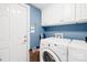 Convenient laundry room with washer, dryer, and cabinets at 144 Spring Forest Dr, Shelby, NC 28152