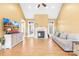 Cozy living room features a fireplace, hardwood flooring, and a vaulted ceiling at 144 Spring Forest Dr, Shelby, NC 28152