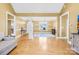 Bright open living area with hardwood floors, chandelier lighting, and neutral paint at 144 Spring Forest Dr, Shelby, NC 28152