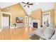 Spacious living room boasts hardwood floors, a fireplace, and bright, airy ambiance at 144 Spring Forest Dr, Shelby, NC 28152