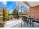 Brick patio with table and chairs, offering a relaxing outdoor space at 144 Spring Forest Dr, Shelby, NC 28152