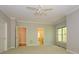 Bright, carpeted bedroom with double windows offering natural light and an en-suite bathroom at 1448-1 New Prospect Church Rd, Shelby, NC 28150