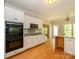 Modern kitchen with double oven, microwave, and stainless steel appliances at 1448-1 New Prospect Church Rd, Shelby, NC 28150