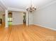Spacious living room featuring hardwood floors and seamless transitions to other spaces at 1448-1 New Prospect Church Rd, Shelby, NC 28150