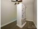 A bright room with fresh paint, hardwood floors and an elegant antique wardrobe at 1448-1 New Prospect Church Rd, Shelby, NC 28150