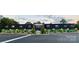 Striking building exterior highlighted by modern design, artistic murals, and professional landscaping at 2000 Patio Ct # 129, Charlotte, NC 28205