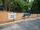 Dog park with sign and blue bench at 2000 Patio Ct # 129, Charlotte, NC 28205