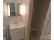 Bathroom with vanity, sink, and a shower stall at 2044 Helen Dr, Gastonia, NC 28054