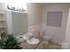 Clean bathroom with a tub, toilet and vanity at 2044 Helen Dr, Gastonia, NC 28054
