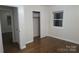 Spacious bedroom with hardwood floors and a large closet at 2044 Helen Dr, Gastonia, NC 28054