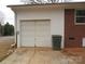 Attached garage with an automatic door and ample space at 2044 Helen Dr, Gastonia, NC 28054
