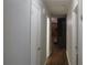 Bright hallway with hardwood floors and access to multiple rooms at 2044 Helen Dr, Gastonia, NC 28054