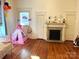 Hardwood floors, fireplace, and ample space for furniture at 217 Brent St, Wadesboro, NC 28170