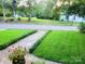 Landscaped yard with a walkway leading to the house at 217 Brent St, Wadesboro, NC 28170