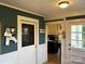 View into kitchen from side entry with a glimpse of kitchen at 217 Brent St, Wadesboro, NC 28170