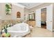 Spa-like bathroom with soaking tub and walk in shower at 227 Wildwood Cove Dr, Mooresville, NC 28117