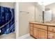 Clean bathroom with granite countertop and wood cabinets at 227 Wildwood Cove Dr, Mooresville, NC 28117