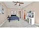Comfortable bedroom with a desk and built-in shelving at 227 Wildwood Cove Dr, Mooresville, NC 28117