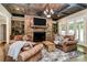 Cozy Gathering room with stone fireplace and coffered ceiling at 227 Wildwood Cove Dr, Mooresville, NC 28117