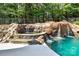 Enjoy the hot tub with a waterfall feature at 227 Wildwood Cove Dr, Mooresville, NC 28117