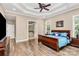 Main bedroom with hardwood floors and ensuite bathroom access at 227 Wildwood Cove Dr, Mooresville, NC 28117