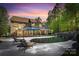 Inviting pool and patio area with waterfall feature at 227 Wildwood Cove Dr, Mooresville, NC 28117