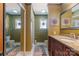 Elegant bathroom with granite countertops, double sinks and updated fixtures at 3406 Red Fox Trl, Weddington, NC 28104