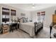 Cozy bedroom featuring a comfortable bed and workspace at 3406 Red Fox Trl, Weddington, NC 28104