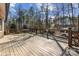 Relaxing deck overlooking a wooded backyard at 3406 Red Fox Trl, Weddington, NC 28104