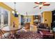 Charming dining area with a wooden table and views of the kitchen at 3406 Red Fox Trl, Weddington, NC 28104