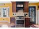 Modern kitchen with stainless steel appliances and wood cabinets at 3406 Red Fox Trl, Weddington, NC 28104