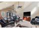 Spacious living room with vaulted ceiling, leather furniture and backyard access at 3406 Red Fox Trl, Weddington, NC 28104