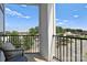 Spacious balcony with wicker chairs, offering city views at 3630 N Davidson St # 4413, Charlotte, NC 28205