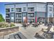Inviting community patio with seating and fire pit at 3630 N Davidson St # 4413, Charlotte, NC 28205