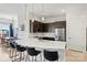 Open concept kitchen with island and stainless steel appliances at 3630 N Davidson St # 4413, Charlotte, NC 28205