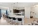 Open concept kitchen with island and stainless steel appliances at 3630 N Davidson St # 4413, Charlotte, NC 28205