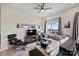 Bright living room featuring a sectional sofa and large windows at 3630 N Davidson St # 4413, Charlotte, NC 28205