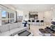 Open living space with modern kitchen and city views at 3630 N Davidson St # 4413, Charlotte, NC 28205