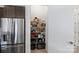 Well-stocked pantry with ample shelving for storage at 3630 N Davidson St # 4413, Charlotte, NC 28205